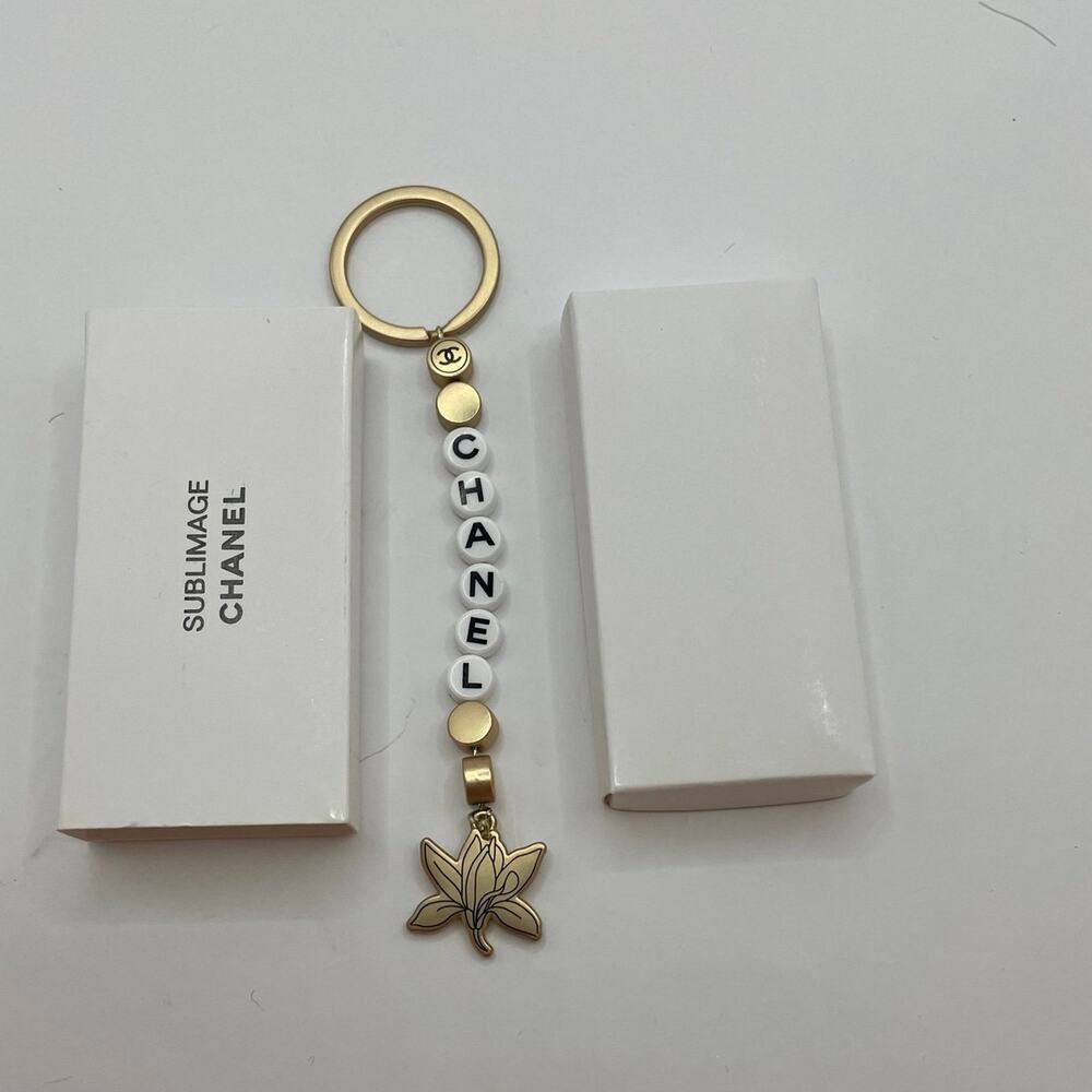 NEW WITH BOX    CH AN EL SUBLIMAGE GIFT Keychain Key RING charm Bag 2024 Brand N